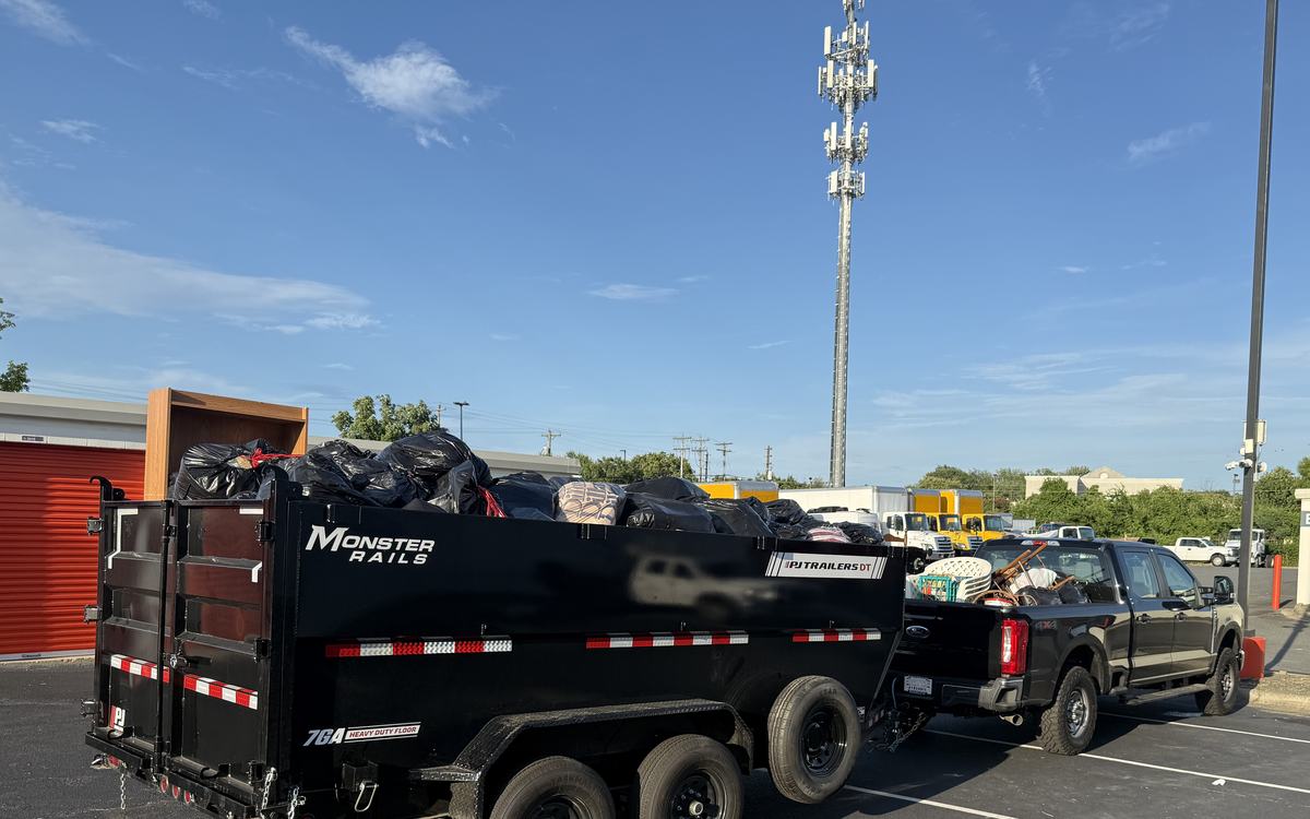 The trailer and truck loaded and ready to leave a job
