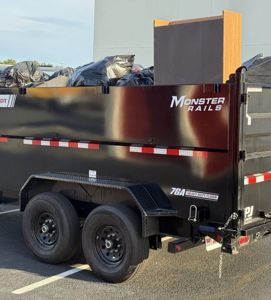 Junk Removal: the Haulchemy dump trailer loaded with a mixed household job