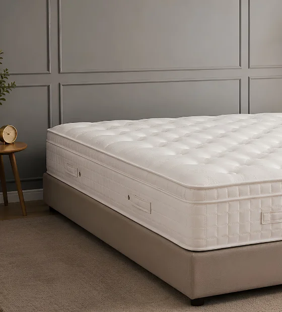 Mattress Removal: a mattress and box spring standing in an empty bedroom
