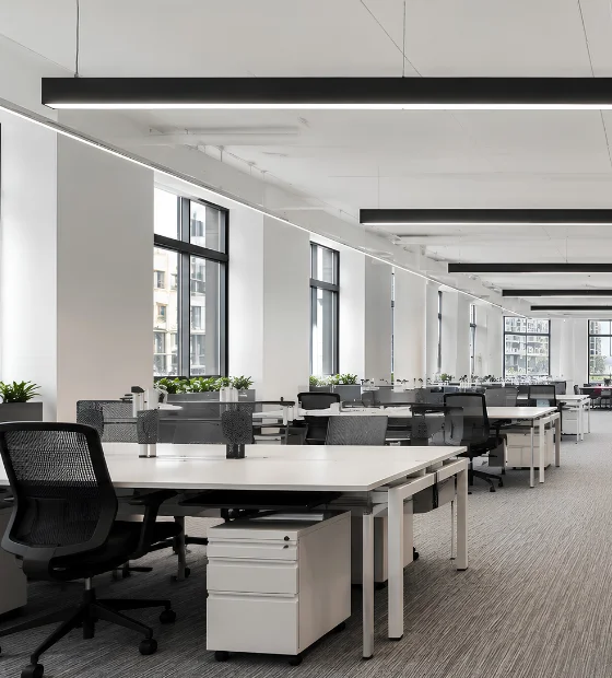 Office Cleanouts: an open-plan office floor with desks, chairs and partitions